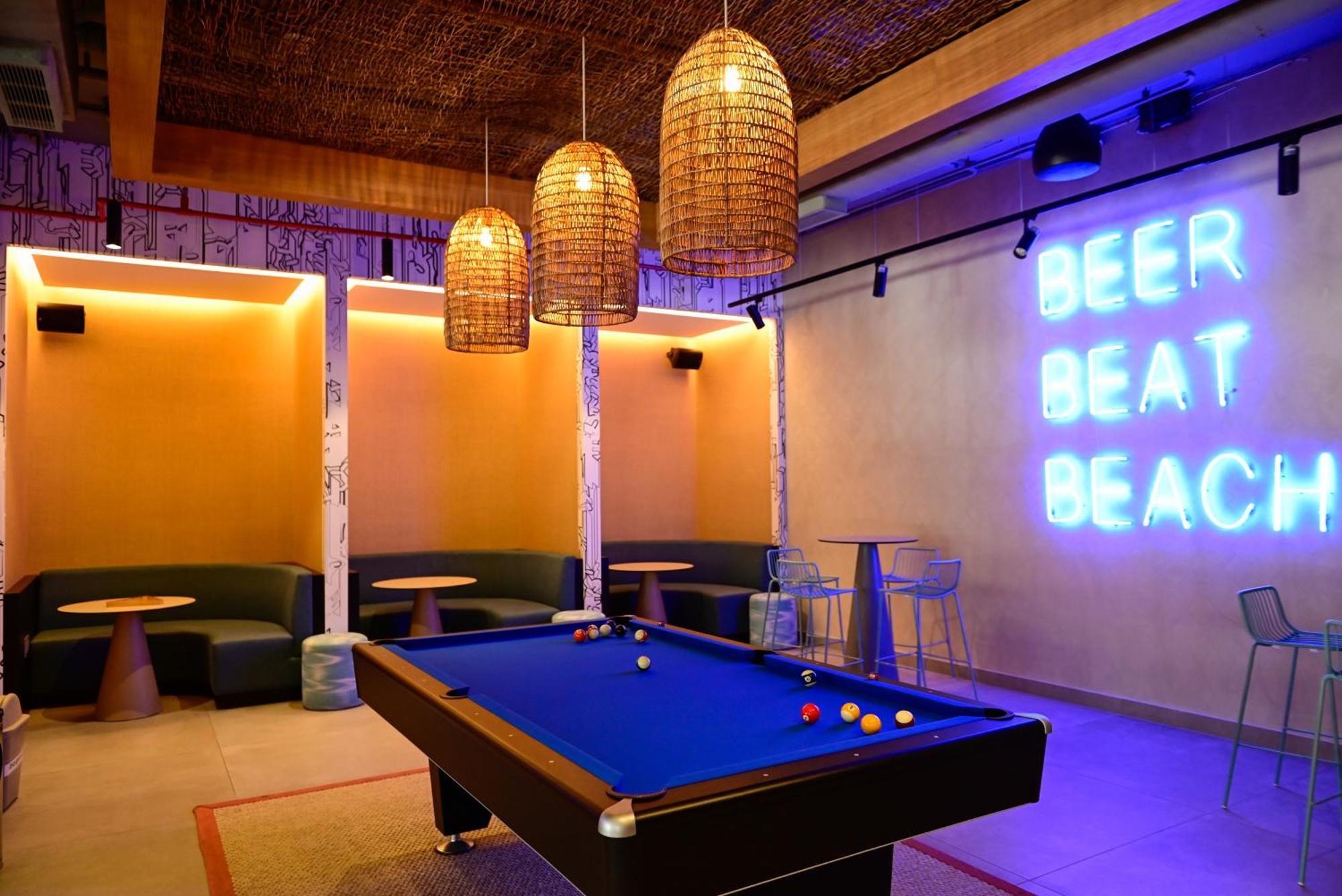 Aloft Playa Del Carmen Hotel Ngoại thất bức ảnh The interior of the bar